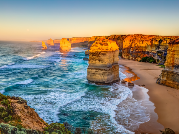 Golden hour glow over the iconic 12 Apostles